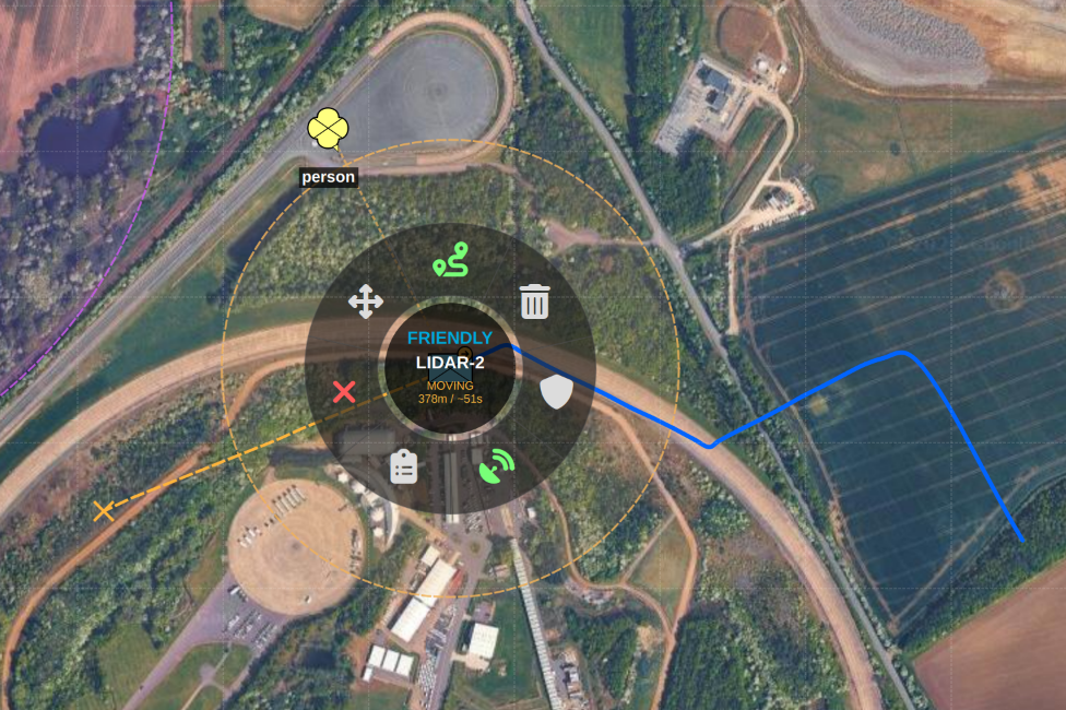 SAPIENT sensor move tasking - the radial menu for a moving sensor node, showing the Cancel Move action alongside a live MOVING status with distance and estimated time remaining